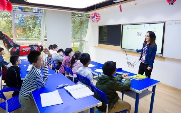 students and a teacher in a classroom